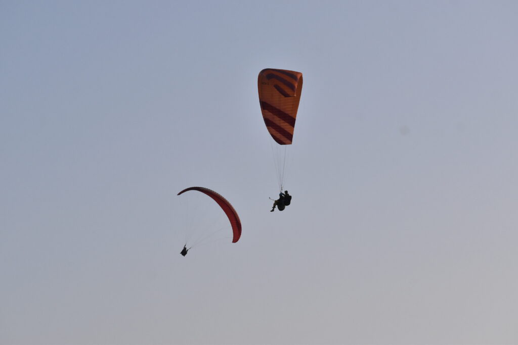 Embracing the Sky's Beauty with Paragliding Excitement: Escape in Bir